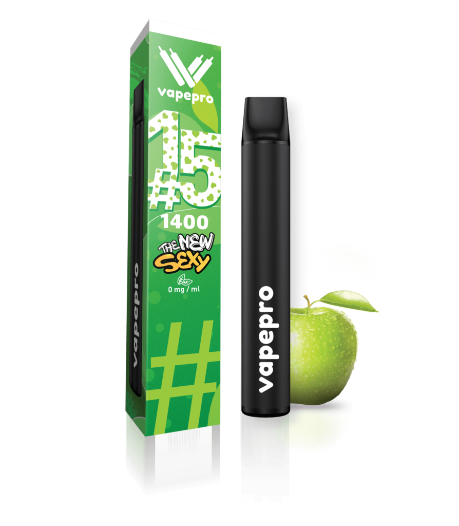 Φωτογραφία του ηλεκτρονικού τσιγάρου μιας χρήσης Vapepro στη γεύση #15 GREEN APPLE. Στη φωτογραφία φαίνεται η πράσινη συσκευασία. Πάνω πάνω στη συσκευασία υπάρχει το logo της Vapepro και από κάτω γράφει #15 και έχει την ένδειξη 0 mg/ml κάτω από ένα φύλλο καπνού. Δίπλα στη συσκευασία βλέπουμε την κομψή και λεπτή μαύρη συσκευή vapepro. Διπλα σε αυτα υπάρχει ένα λαχταριστό μήλο.
